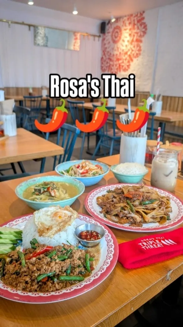 The video showcases Rosa's Thai restaurant in London, highlighting four dishes: Papaya Salad, Green Curry, Drunken Noodles, and Chilli Basil Stir-Fry. Each dish is presented with a focus on its vibrant colors and textures. The restaurant's exterior is also shown briefly.  No specific dietary information is provided.