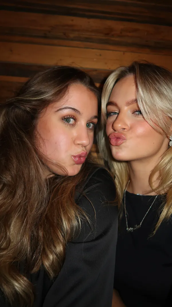 The video follows a group of young women enjoying a night out at a bar called Cocktails Cantina Club in London. It shows them drinking cocktails, taking photos in the restroom, and dancing on the dance floor.  The cocktails shown include a pinkish-orange cocktail served in a coupe glass and a clear drink in a rocks glass. The presentation focuses on the drinks and the fun atmosphere of the bar.  No dietary information is provided.