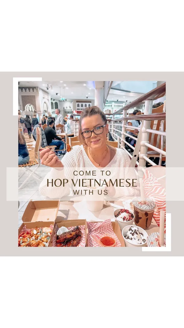 The video showcases HOP Vietnamese Street Eats, a restaurant located in the Trafford Centre, Manchester. It features a variety of dishes including rice boxes (chargrilled pork satay), pho noodle soup (beef brisket), pork ribs, loaded HOP tots, Viet fried chicken, and soft serve ice cream. The food presentation is visually appealing, with a focus on vibrant colors and appealing textures. Dietary information isn't explicitly highlighted but some dishes are marked (VE) indicating vegetarian options. The main focus is on showcasing a selection of food items from the restaurant and sharing the positive experience of dining there.