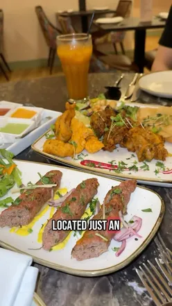 Tikka ‘n’ Talk restaurant dishes: Chef's platter, Dhora Seekh, Chicken Biryani, Korma, Lajawab, Peshwari Naan, Mango Tiramisu.