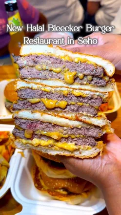 Halal Bleecker Burger in Soho, featuring juicy Double Cheeseburger with caramelized onions and Blue Burger with tangy blue cheese.