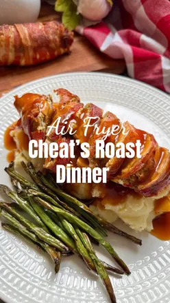 🍗 Air Fryer Cheat’s Roast Dinner 🍗

Stuffed Chicken Wrapped in Bacon with Mash, Crispy Green Beans & Gravy

When you want roast dinner vibes… but you’ve only got 20 minutes!

Ingredients (serves 2):

For the stuffed chicken:
2 chicken breasts, butterflied
6 slices of streaky bacon, I love @oakparkfoods 
Salt & pepper

Quick stuffing:
1 slice of bread (sourdough or GF), blitzed into crumbs
1 tbsp butter
1/2 onion, diced
1 garlic clove, crushed
1 tsp dried sage and thyme
Salt & pepper to taste

To serve:2 portions of mashed potato 200g green beans, trimmed
Your fave gravy

Method:

For the stuffing, sauté the onions in a pot with the butter, mix in the breadcrumbs, garlic, herbs, and seasoning, add a little extra butter or splash of stock if too dry.

Butterfly/Cut into the centre of each  chicken breast, to create a pocket, then add a layer of stuffing inside, then fold it back over. 

Wrap each breast tightly with streaky bacon (3 rashers each), tucking the ends underneath. Season lightly on top.

Pop into your air fryer basket and cook at 200°C for 15 minutes, or until the bacon is crispy and the chicken is cooked through.

Prep your mash as standard, then toss the green beans with a little olive oil, salt, and pepper and Air fry for 8–10 minutes, shaking halfway, until crispy and slightly blistered.

When the chicken is ready, slice up and serve on a bed of mash, with the crispy green beans, and pour over hot gravy. 

Then enjoy your 20 minute roast masterpiece!
.
.
#airfryer #roastdinner #foodhacks #airfry #stuffedchicken #roastchicken #chickendish #easyrecipeideas #20minutemeals