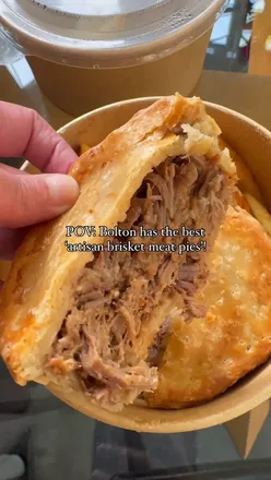 Artisan brisket meat pie from Bolton's dark kitchen, smoked low and slow, with crunchy pastry, halal, delivered in Manchester.