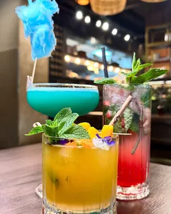 Afrikana Kitchen dishes: loaded nachos with fried chicken, lamb chops with pomegranates, butterfly chicken on jollof rice, steak on brioche with sweet potato fries, strawberry mojito, Afrikana fruit punch, peanut butter crunch dessert, molten chocolate cake, Afrikana, Manchester.