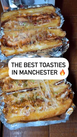 Spicy dipped and BBQ chicken toasties with loaded truffle mac & cheese fries at The Grubfellas, Withington, Manchester.