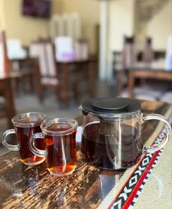 Yemeni and Middle Eastern dishes at Palm Tree, Glasgow: lamb Madfoon, Chicken Mandi, Fattosh salad, Warq e Anab, margaritas, cheese kunafa, traditional kehwa, shredded chicken. Cozy, authentic vibes in Glasgow City Centre.