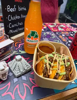 Beef Birria and Chicken Tinga tacos at Alma Mexicana, Barras Market, Glasgow, with pico de gallo, guacamole, and chipotle mayo.