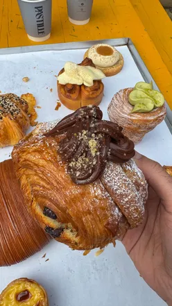 Explore Liverpool's top food spots: Pastille Bakery's pastries, Castro's Spanish cuisine, and Nashville Cluck's fried chicken.