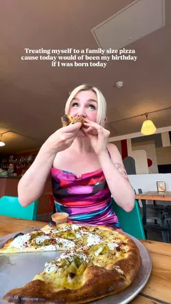 Sourdough pizza with pepperoni from Soap Street Pizza in Manchester, perfect for carb lovers and foodies.