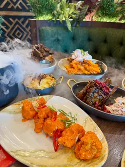 African inspired feast at Afrikana Kitchen, Manchester: spicy glazed chops, spiced steak, mac n’ cheese, Afrikana fries, mocktails.