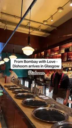 Dishoom Glasgow: 1950s Bombay Noir vibe with jazz, curries, grills, and Bombay-inspired cocktails at 6-11 Nelson Mandela Place.