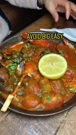 Plate of BBQ ribs with fries at Big Easy London, highlighting poor service experience. #londonfood #badservice