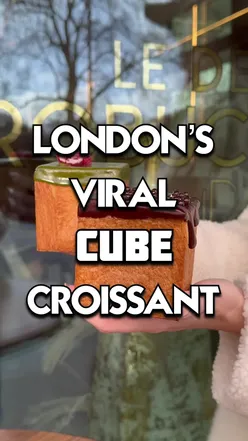 Flaky, golden croissant from a trending London bakery, perfect for pastry lovers and foodies exploring London food spots.