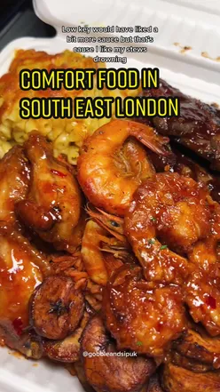 Plate of flavorful African soul food from Cooked By B in Woolwich, featuring vibrant spices and hearty ingredients.