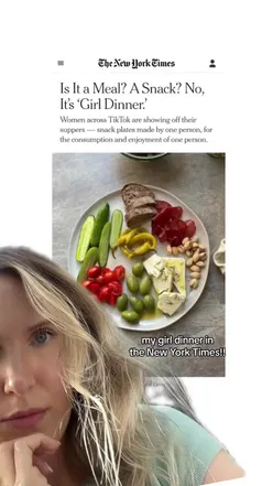 A vibrant girl dinner featuring olives, tomatoes, bread, and cheese, celebrated in the New York Times.