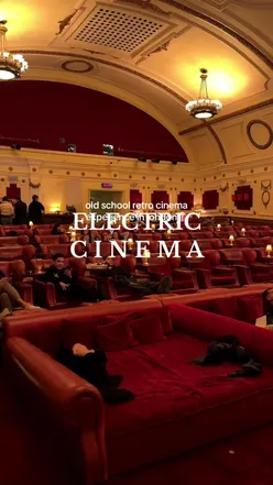Couple enjoying milkshakes and diner food before a movie at Electric Cinema, Notting Hill, London. Perfect date night spot.