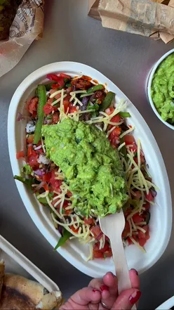 Delicious Chicken al Pastor with vibrant spices, ready to order. Limited time offer at Chipotle UK. #alpastor