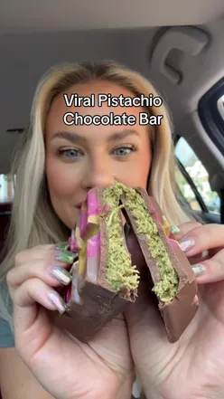 Viral UK pistachio chocolate bar on display, highlighting rich chocolate and crunchy pistachios, perfect for snack lovers.