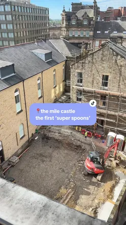 Exterior of The Mile Castle in Newcastle, featuring a large beer garden and vibrant atmosphere for socializing.