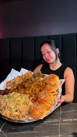 Delicious halal burger platter with kebabs, served at Phat for Life in London, perfect for foodies.