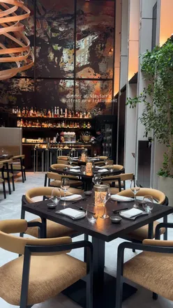 Chef Akira Back's restaurant in Mandarin Oriental Mayfair offers Japanese-Korean cuisine, bento boxes, tuna pizza, sashimi, and wagyu.