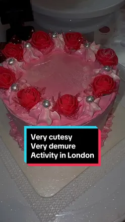 Women designing cakes at CupNCake London workshop, using tools and ingredients for a fun, creative birthday activity.