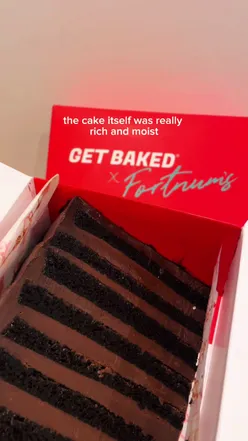 Delicious Bertha cake from Get Baked, a must-try dessert in London, featuring rich chocolate layers.