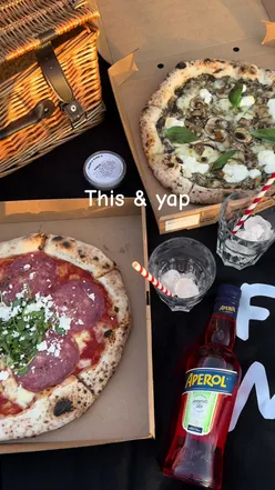 Sourdough pizza and Aperol Spritz in sunny Glasgow at Franco Manca, capturing a vibrant outdoor dining vibe.