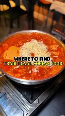 Delicious Korean street food featuring cheesy tteokbokki and fresh kimbap in London, a hidden gem for food lovers.