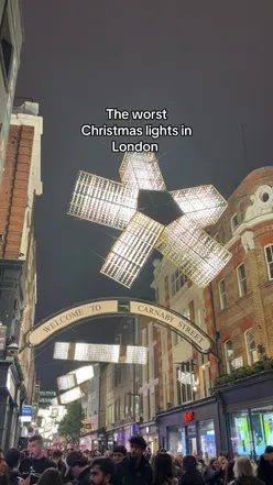 Carnaby Street 2024 Christmas lights with geometric cube design, lacking festive charm, London Christmas lights display.