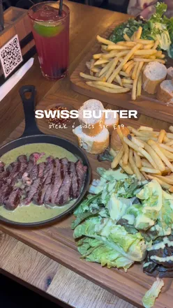 Delicious steak and chips with salad, bread, and SB sauce at Swiss Butter, London. Affordable meal for £19.