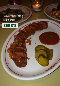 Delicious hot dog and cocktail at new Glasgow opening, Sebbs. Discover top Scottish food spots and activities.