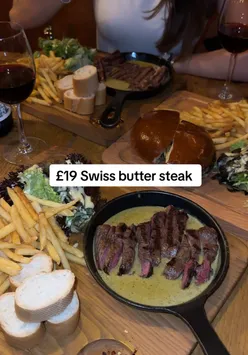 Swiss butter steak and wagyu burger at Swiss Butter, Holborn, London. Juicy steak with butter, delicious burger special.