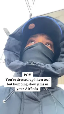 Person enjoying a slow jam while sipping a steaming cup of coffee, capturing a cozy morning vibe.