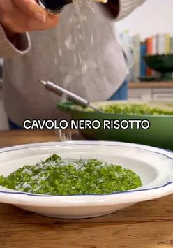 Deep green cavolo nero risotto with nutmeg, Grana Padano, and olive oil, perfect for midweek meals or dinner parties.