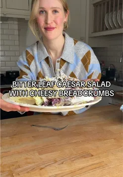 Bitter leaf Caesar salad with fried capers, creamy yogurt dressing, cheesy breadcrumbs, and Grana Padano cheese.