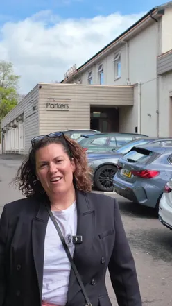 A satisfied diner at Tudor Hotel Airdrie enjoying delicious Indian food, ready for a nap after a hearty meal.