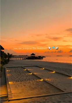 Luxury beachfront view at Six Senses Laamu, Maldives, with palm trees and ocean, ideal for honeymoon and sustainable travel.