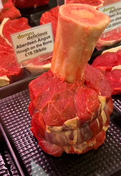Juicy rib of beef at Scottish Farm Shop in Biggar, featuring Errington Cheese and Make It Scotch products.