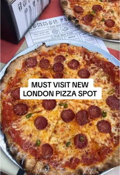 Delicious NYC or Detroit style pizza at Common Pizza, Clapham, with a free drink offer during rain.